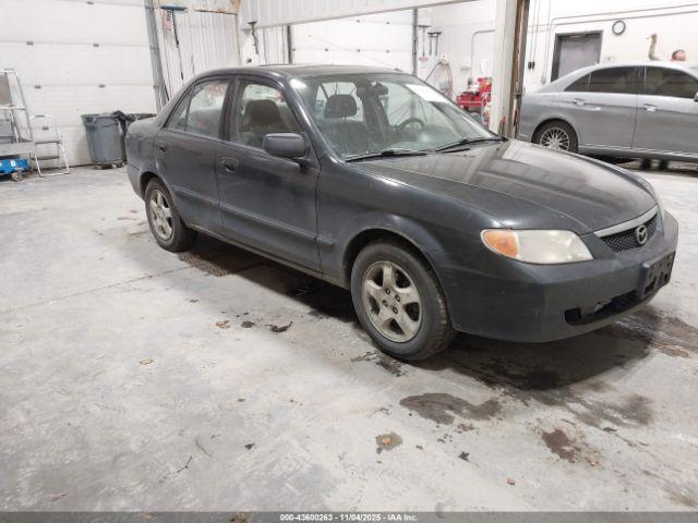  Salvage Mazda Protege